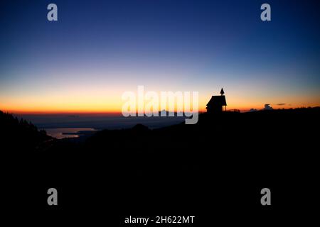 chapel on the steinling alm below the kampenwand,bavaria,upper bavaria,kampenwand (1669 m) in the chiemgau,sunrise chiemgau alps,near aschau,southern germany,germany Stock Photo