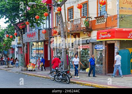 Chinese shops and restaurants in Chinatown / Barrio Chino along the Avenida Juan Pablo Duarte in the city Santo Domingo, Dominican Republic, Caribbean Stock Photo