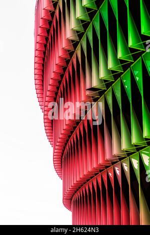 Green, red and white futuristic design texture background. Soccer stadium structure Stock Photo