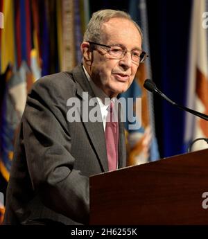 Former Secretary of Defense Dr. William Perry delivers remarks shortly before 25th Secretary of Defense Ash Carter is sworn in during a ceremony in the Pentagon Auditorium, March 6, 2015. Stock Photo