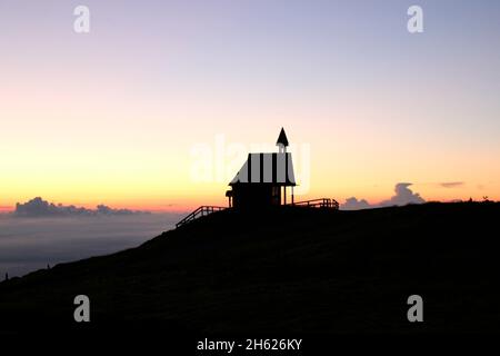 steinling alm chapel below the kampenwand,bavaria,upper bavaria,kampenwand (1669 m) in the chiemgau,sunrise chiemgau alps,near aschau,southern germany,germany Stock Photo