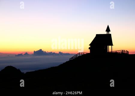 steinling alm chapel below the kampenwand,bavaria,upper bavaria,kampenwand (1669 m) in the chiemgau,sunrise chiemgau alps,near aschau,southern germany,germany Stock Photo