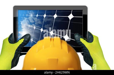 Engineer with protective work gloves and hard hat holding a digital tablet computer with solar panel inside the screen. Isolated on white background. Stock Photo