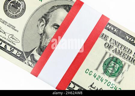 Close up of blank currency strap with five dollar money bundle. Stock Photo