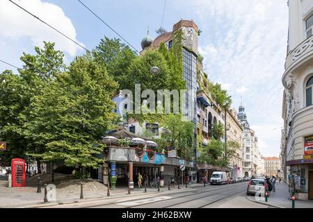 the hundertwasserhaus,residential complex and terrace cafe,löwengasse at the corner of kegelgasse,3rd district,landstrasse,vienna,austria Stock Photo