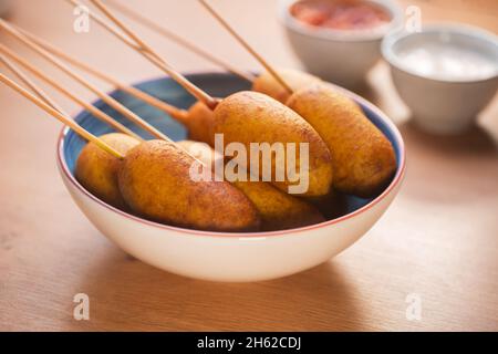 Corn dog cooked with sausage and wheat dough with the addition of corn flour Stock Photo