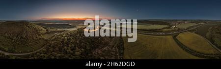 germany,thuringia,wandersleben,castle ruins gleichen,illuminated scenery,fields,motorway,wachsenburg (far in the background),mühlburg (far in the background),fog fields,partly back light,dawn,night-day transition,360 –° panorama Stock Photo