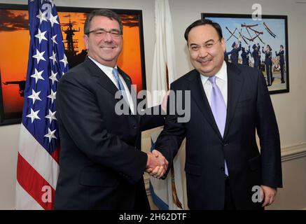 Deputy Secretary of Defense Ashton B. Carter welcomes Kazakhstan's Minister of Foreign Affairs, Yerzhan Kh. Kazykhanov, to the Pentagon for meetings Tuesday, January 31, 2012. Stock Photo