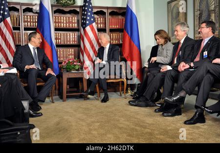 Russian Foreign Minister Sergei Lavrov and Vice President of the United States Joe Biden sit for bilateral talks in Munich, Germany, Feb. 2, 2013. Seated at right is Deputy Secretary of Defense Ashton B. Carter Stock Photo