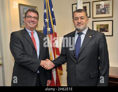 Deputy Secretary of Defense Ashton Carter meets with Afghan Minister of Defense Bismillah Mohammadi during a visit by Afghan defense officials at the Pentagon Jan. 9, 2013 Stock Photo