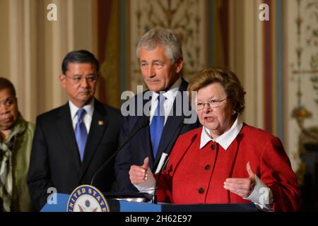 Senate Appropriations Committee Chairwoman Senator Barbara Milkulski, flanked by Secretary of Defense Chuck Hagel and Veterans Affairs Secretary Eric Shinseki, addresses the media ca. 2013
