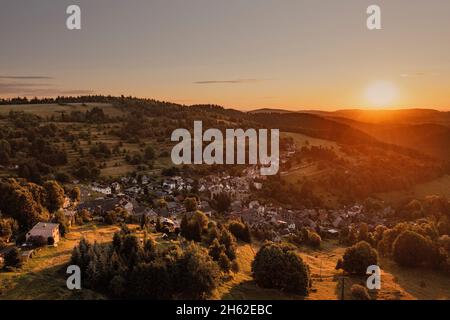 germany,thuringia,rural community schwarzatal,deesbach,village,sunrise,overview,morning light Stock Photo