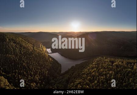 germany,thuringia,rural community schwarzatal,deesbach,reservoir,landscape,forest,mountains,valleys,sun,back light Stock Photo