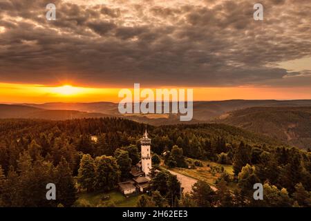 germany,thuringia,rural community schwarzatal,oberweißbach,observation tower,landscape,forest,mountains,sunrise,back light Stock Photo