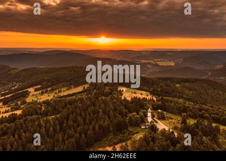 germany,thuringia,rural community schwarzatal,oberweißbach,observation tower,landscape,forest,mountains,sunrise,back light Stock Photo