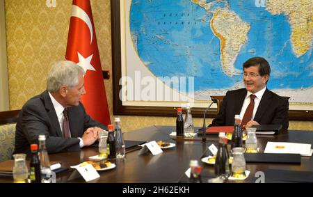 U.S. Secretary of Defense Chuck Hagel, left, meets with Turkish Prime Minister Ahmet Davutoglu in Ankara, Turkey, Sept. 8, 2014.