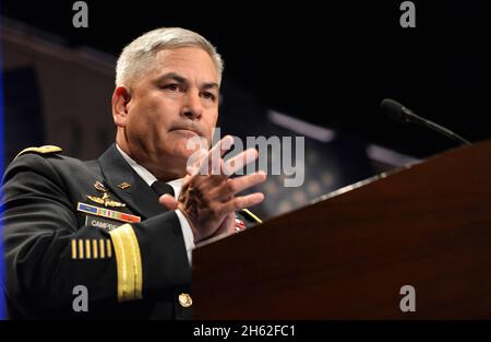 U.S. Army General John Campbella, the vice chief of staff of the Army, delivers remarks during a ceremony honoring the latest Medal of Honor recipient, U.S. Army Staff Sgt. Ty M. Carter, at the Pentagon in Arlington, Va., Aug. 27, 2013. Carter was awarded the Medal of Honor Aug. 26, 2013, for actions during the Battle of Kamdesh at Combat Outpost Keating, Nuristan province, Afghanistan, Oct. 3, 2009. Carter was a cavalry scout with Bravo Troop, 3rd Squadron, 61st Cavalry Regiment, 4th Brigade Combat Team, 4th Infantry Division at the time of the battle. Stock Photo