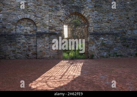 wetter an der ruhr,north rhine-westphalia,germany - wetter castle in the historic old town of wetter an der ruhr. entrance gate in the back light. Stock Photo