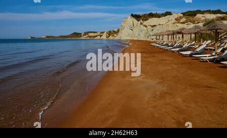greece,greek islands,ionian islands,kefalonia,xi beach,red sands,rocks white,sky blue Stock Photo