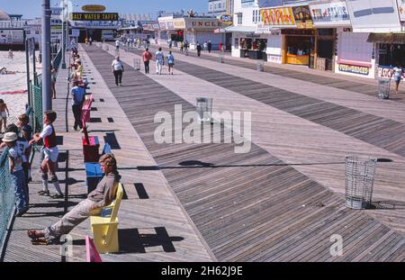 Boardwalk above, Seaside Heights, New Jersey; ca. 1978. Stock Photo