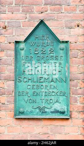 memorial plaque on the house where heinrich schliermann was born,neubukow,mecklenburg-western pomerania Stock Photo