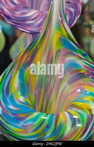 england,isle of wight,the needles landmark attraction,the needles alum bay glass makers shop,display of colourful glass vases Stock Photo