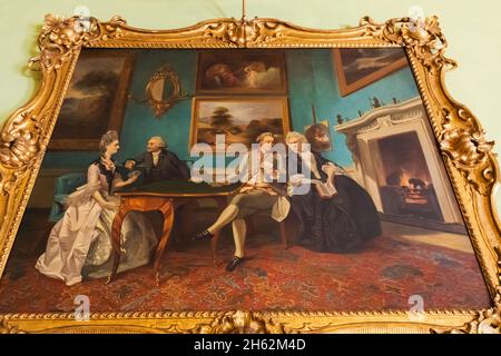 england,hampshire,hinton ampner house,the dining room,painting of the dutton family playing cards Stock Photo