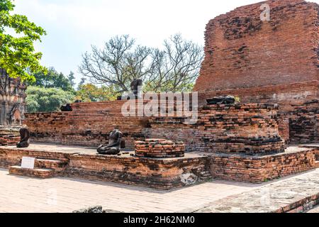 buddha statues without heads,wat mahathat,wat maha that,buddhist temple complex,built in 1374 below king borommaracha i,ayutthaya historical park,ayutthaya,thailand,asia Stock Photo