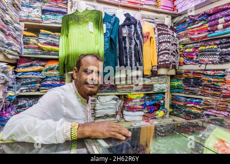 MORRELGANJ, BANGLADESH - NOVEMBER 18, 2016: Shop keeper in Morrelganj village, Bangladesh Stock Photo