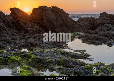 france,brittany,saint-coloumb,sunset on the rocky coast,plage des chevrets,atlantic coast Stock Photo