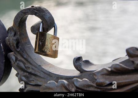 france,paris,a love lock with the eiffel tower hangs on the historic pont notre dame bridge Stock Photo