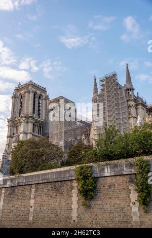 france,paris,scaffolded notre dame cathedral,reconstruction after the fire in april 2019,major construction site Stock Photo