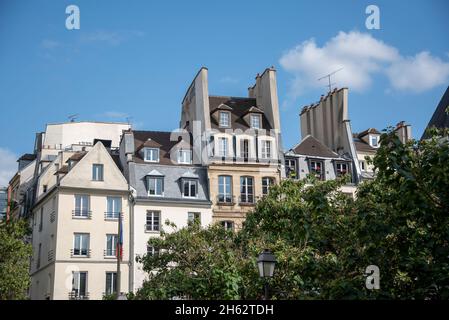 france,paris,historic apartment buildings in the parisian district of beaubourg Stock Photo