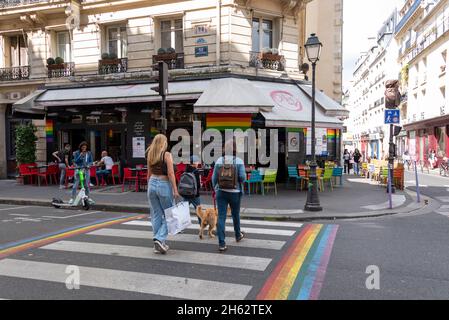 france,paris,tourists walk across a zebra crossing in the rue des archives in the jewish district of the marais Stock Photo