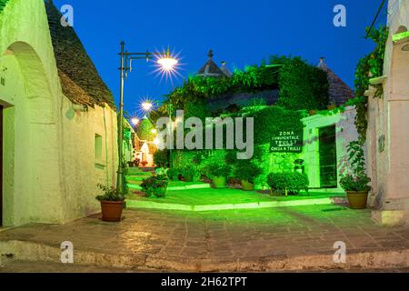 alberobello,bari province,salento,apulia,italy,europe. dawn in alberobelle with the typical trulli houses with their conical roof in drywall style Stock Photo