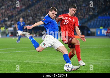 Rome, Italy. 12th Nov, 2021. Andrea Belotti (Italy) Fabian Schar (Switzerland) during the FIFA World Cup Qatar 2022 Group C qualification football match between Italy and Switzerland at the Olimpico stadium in Rome on November 12, 2021. Credit: Independent Photo Agency/Alamy Live News Stock Photo