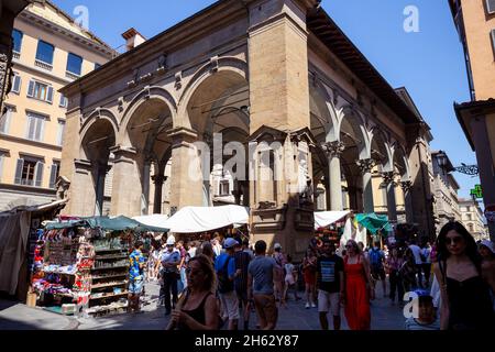 loggia dei lanzi,also called loggia della signoria,is a building on corner of piazza della signoria in florence,italy,adjoining uffizi gallery. it consists of wide arches open to street. Stock Photo