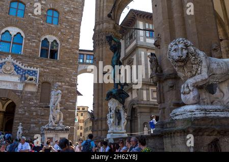 loggia dei lanzi,also called loggia della signoria,is a building on corner of piazza della signoria in florence,italy,adjoining uffizi gallery. it consists of wide arches open to street. Stock Photo