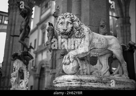 loggia dei lanzi,also called loggia della signoria,is a building on corner of piazza della signoria in florence,italy,adjoining uffizi gallery. it consists of wide arches open to street. Stock Photo