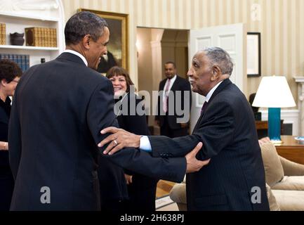 President Barack Obama meets with civil rights movement leader Rev. Dr. Joseph Lowery and his family in the Oval Office, Jan. 18, 2011. Stock Photo