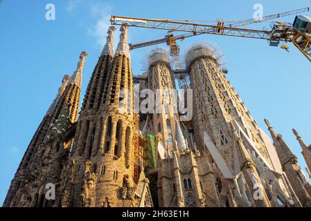 basicila and expiatory church of the holy family,known as sagrada familia at sunset in barcelona. the antoni gaudi masterpiece has become a unesco world heritage site in 1984. Stock Photo