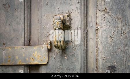 old door knocker in perpignan. Stock Photo