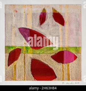 Green and red colored abstract acrylic paint spraiyng on a white