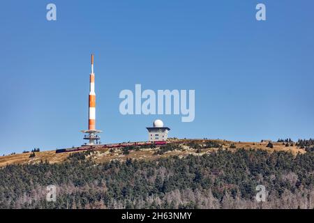 germany,saxony-anhalt,brocken,wernigerode,schierke,brockengipfel,transmission mast,passenger train 8940 goes to the valley,steam locomotive Stock Photo