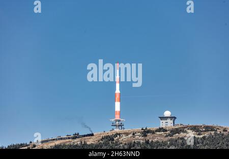 germany,saxony-anhalt,brocken,wernigerode,schierke,brockengipfel,transmission mast,passenger train,steam locomotive Stock Photo