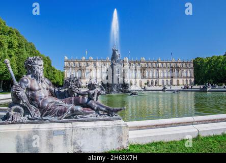 water parterre with fountain in front of the garden side of herrenchiemsee palace,chiemsee municipality,herreninsel,chiemgau,upper bavaria,bavaria,germany Stock Photo