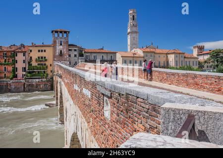 ponte pietra over the adige with bell tower from the cathedral in the old town,verona,adige valley,province of verona,veneto,italy Stock Photo