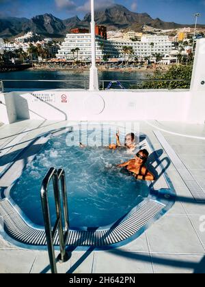 Two women enjoying the whirlpool in a spa Stock Photo - Alamy