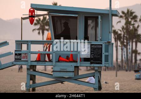 Los Angeles, California, USA. 24th Aug, 2021. A Los Angeles County lifeguard watches people in the water from a tower on Venice Beach. (Credit Image: © Jonathan Alcorn/ZUMA Press Wire) Stock Photo