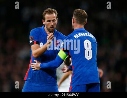 London, UK. 12th Nov, 2021. LONDON, ENGLAND - November 12: L-R Harry Kane (Tottenham) of England gives Captain arms bend to Jordan Henderson (Liverpool) of England during World Qualifying - European match between England and Albania at Wembley Stadium in London on 12th November, 2021 Credit: Action Foto Sport/Alamy Live News Stock Photo